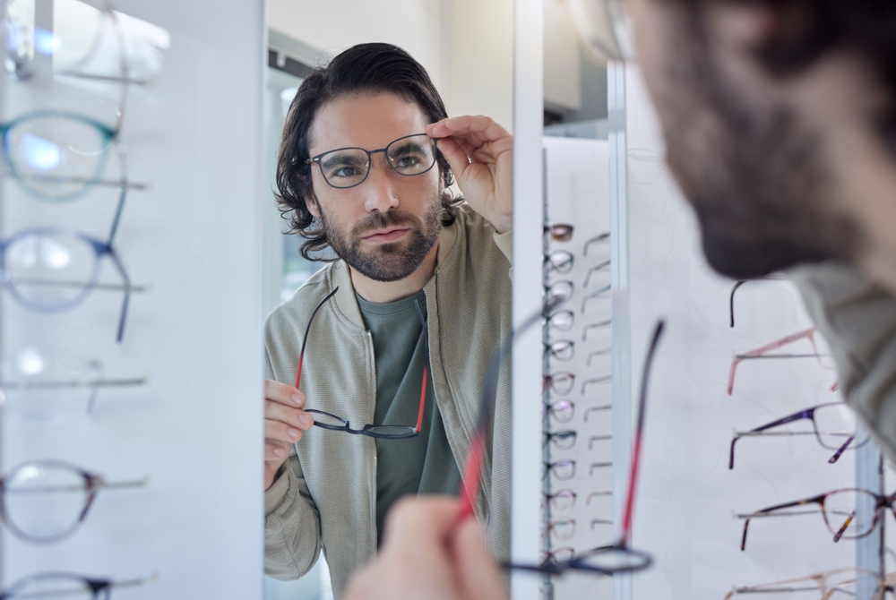 Man fitting eye glasses - Eyeglasses in Grand Rapids