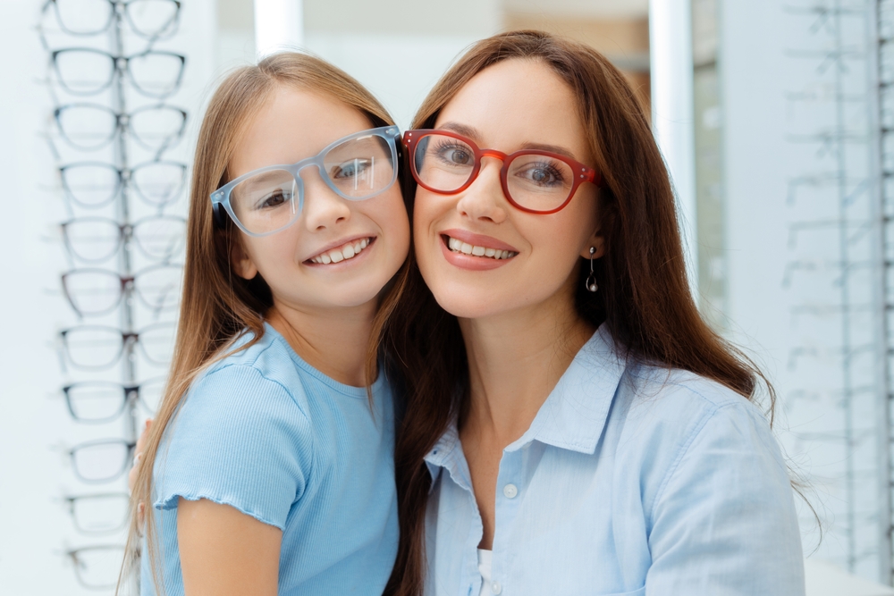 Mother and daughter wearing eye glasses - Eye Doctor Kentwood