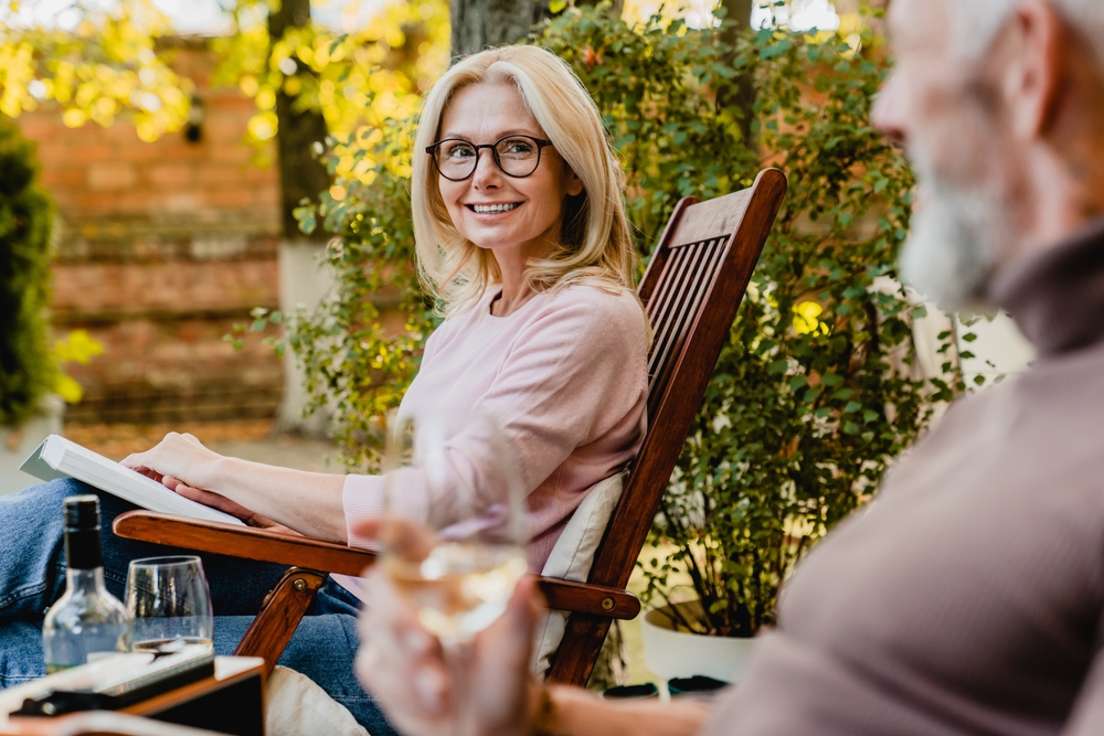 Woman outdoors wearing glasses - Eye Doctor in Rockford